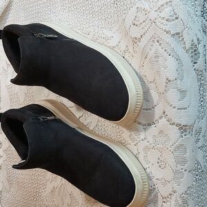 Leather sneaker bootie with zip entry.